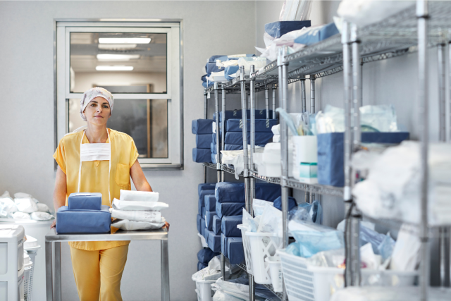 Nurse in medical supply room