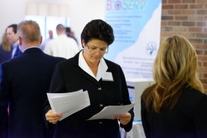 woman looking at papers at the 2017 Pandion Healthcare Innovations Conference