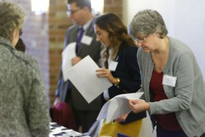 passing out papers at the 2017 Pandion Healthcare Innovations Conference